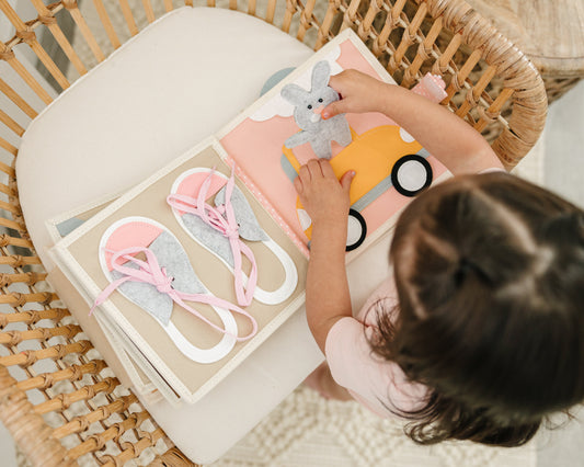 3 Montessori-Inspired Ways to Use a Quiet Book: Independent Play, Bonding Time & Travel Fun.